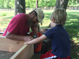Dad and kids building together